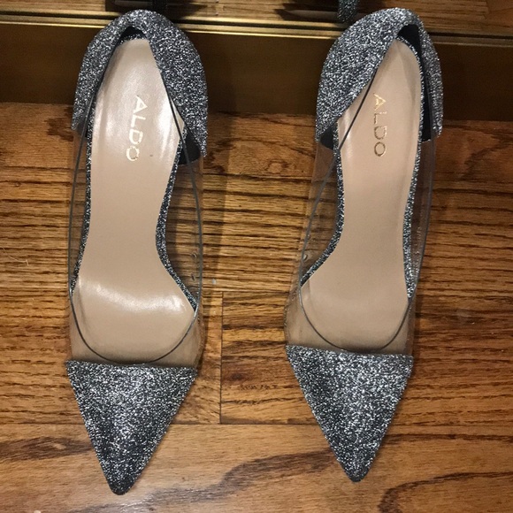 silver and clear pumps